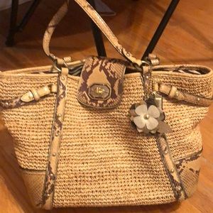 Beige coach pocketbook.